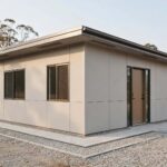 Fire-resistant home design — materials, compact shape, defensible space and glass that give a house a better chance against embers and radiant heat